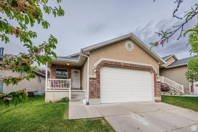 680 Stonne Ln, Kaysville, UT 84037 - single story home with covered porch, driveway, a garage, brick siding, and a front lawn