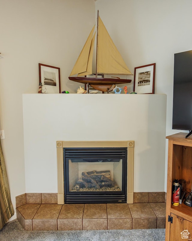 680 Stonne Ln, Kaysville, UT 84037 - room details with carpet floors and a tile fireplace