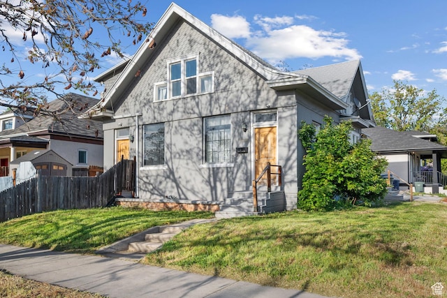 779 S 400 E, Salt Lake City, UT 84111 - bungalow-style house with fence and a front yard