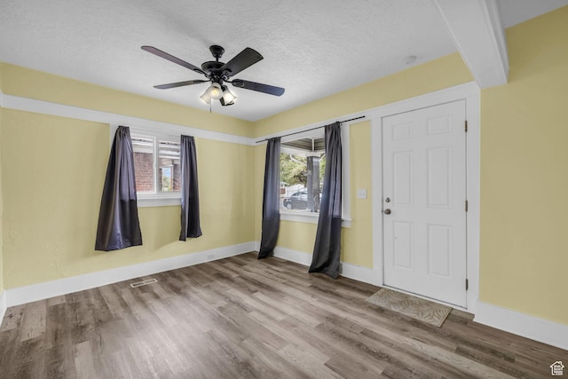 3485 S Grant Ave, Ogden, UT 84403 - interior space featuring baseboards, plenty of natural light, wood finished floors, and visible vents