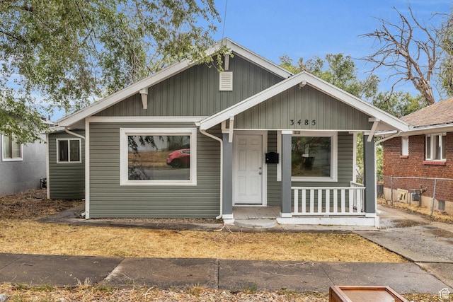 3485 S Grant Ave, Ogden, UT 84403 - bungalow-style house featuring board and batten siding and a porch