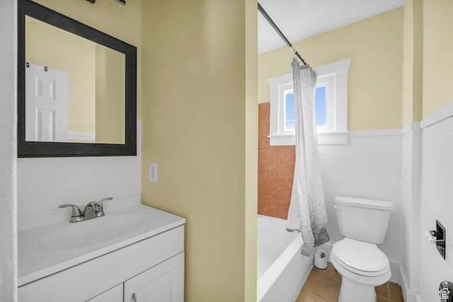 3485 S Grant Ave, Ogden, UT 84403 - full bath with vanity, shower / bathtub combination with curtain, tile patterned flooring, and toilet