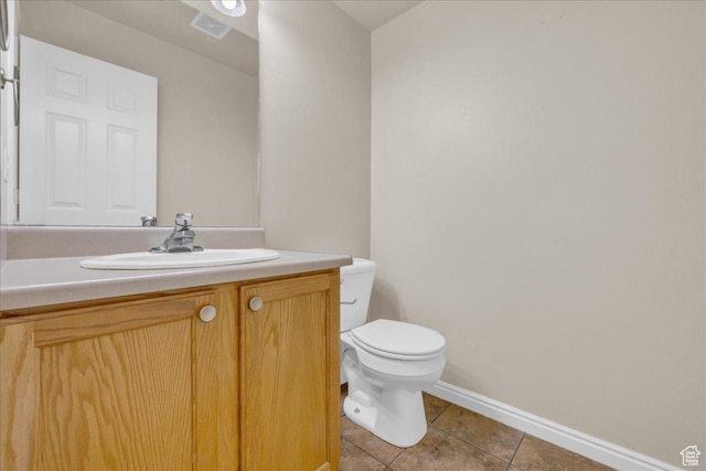 3909 N Davencourt Loop, Lehi, UT 84043 - half bath with visible vents, tile patterned floors, baseboards, vanity, and toilet