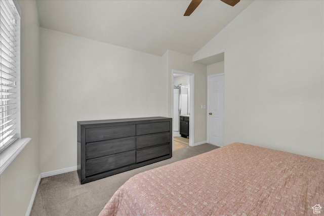 3909 N Davencourt Loop, Lehi, UT 84043 - bedroom with carpet floors, connected bathroom, baseboards, and vaulted ceiling