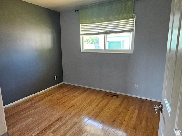 302 E 1400 N, Bountiful, UT 84010 - unfurnished room featuring wood finished floors and baseboards