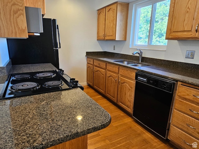 302 E 1400 N, Bountiful, UT 84010 - kitchen with black appliances, light wood-style floors, and brown cabinets