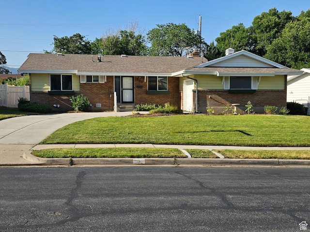 302 E 1400 N, Bountiful, UT 84010 - ranch-style home featuring brick siding, a chimney, driveway, and a shingled roof
