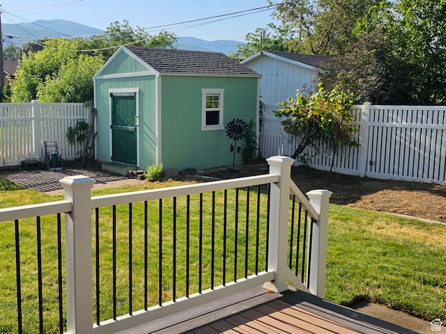 302 E 1400 N, Bountiful, UT 84010 - wooden deck featuring a fenced backyard and a shed