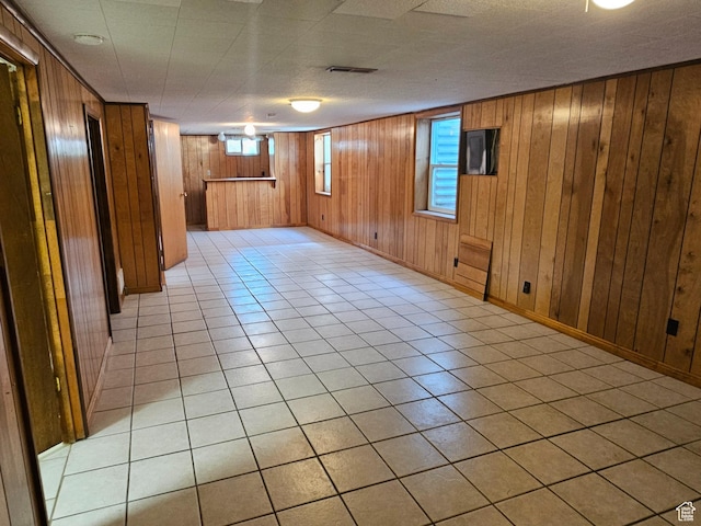302 E 1400 N, Bountiful, UT 84010 - basement with wood walls and light tile patterned floors