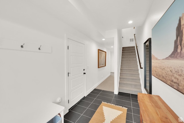 14348 S Champ Cv, Draper, UT 84020 - entrance foyer with dark tile patterned floors, visible vents, stairs, baseboards, and recessed lighting