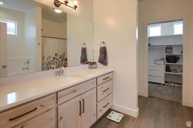 200 W 1200 S Unit 61, Tremonton, UT 84337 - full bath featuring baseboards, curtained shower, wood finished floors, and vanity