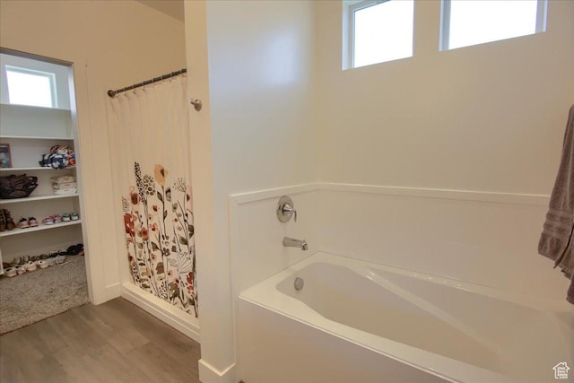 200 W 1200 S Unit 61, Tremonton, UT 84337 - full bath with a garden tub, wood finished floors, a wealth of natural light, and curtained shower