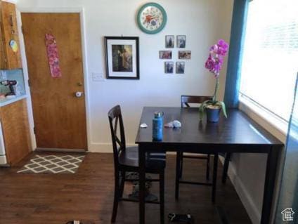 98 W 600 N, Logan, UT 84321 - dining area featuring baseboards and wood finished floors