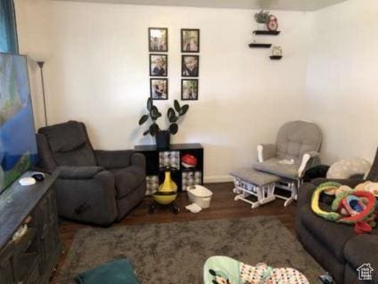 98 W 600 N, Logan, UT 84321 - living room with baseboards and wood finished floors