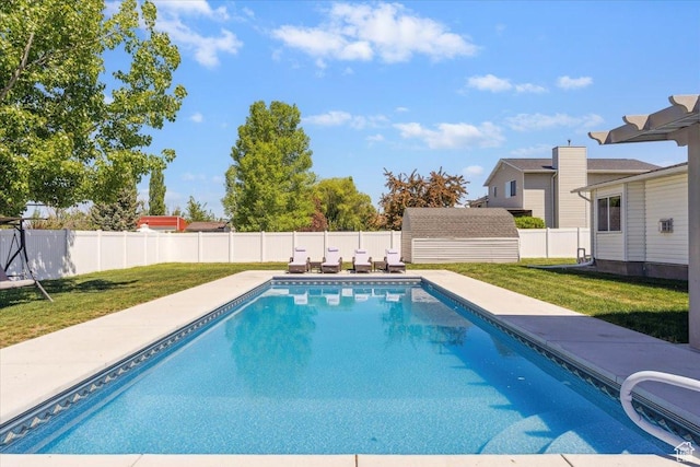 121 N 3000 W, West Point, UT 84015 - view of pool featuring a lawn, an outdoor structure, a fenced in pool, and a fenced backyard