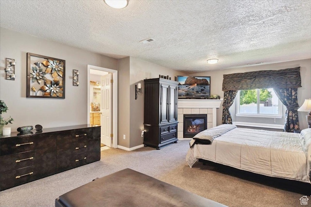 121 N 3000 W, West Point, UT 84015 - carpeted bedroom with baseboards, a textured ceiling, ensuite bath, and a tile fireplace