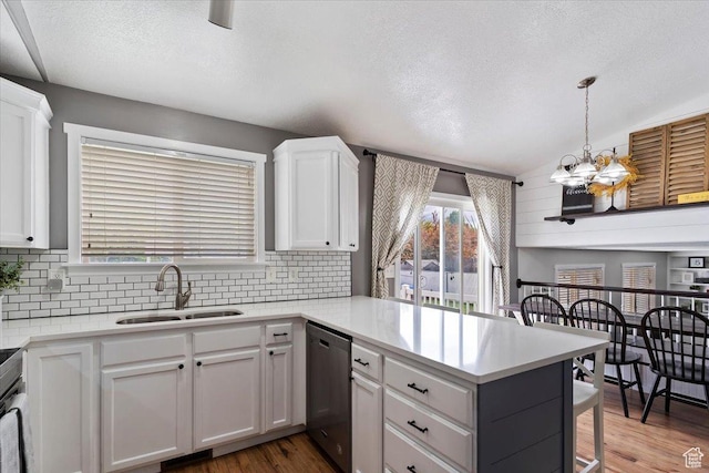 1090 N 3450 W, Layton, UT 84041 - kitchen featuring backsplash, a sink, a peninsula, and dishwasher