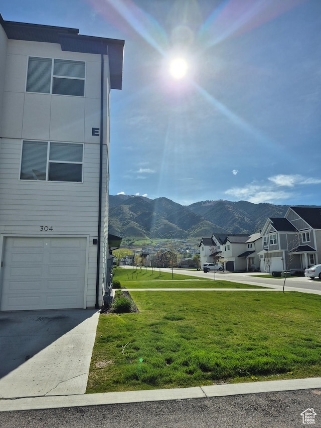 property view of mountains featuring a residential view