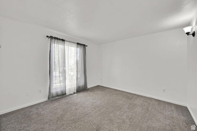 4522 S 2675 W, Roy, UT 84067 - unfurnished room featuring carpet floors, baseboards, and visible vents