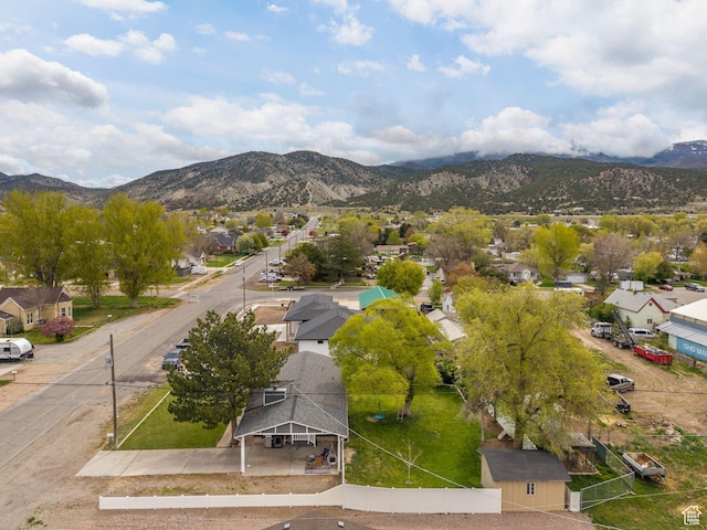 aerial view featuring a mountain view and a residential view