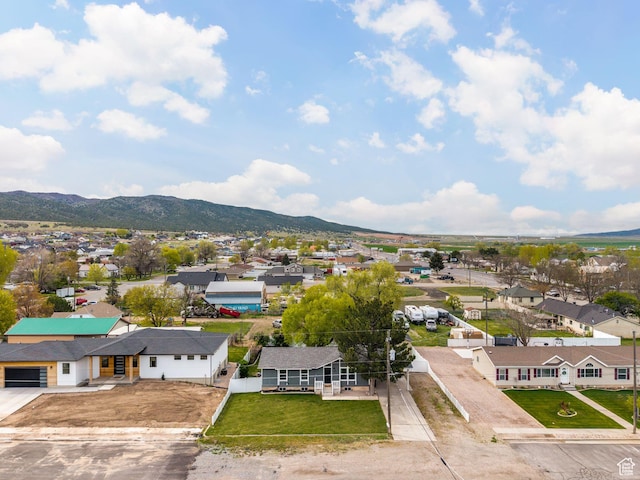 birds eye view of property featuring a residential view and a mountain view