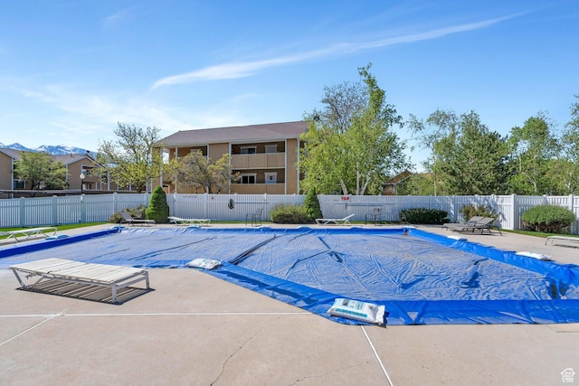 1275 E Shadow Ridge Dr S Unit 10N, Cottonwood Heights, UT 84047 - pool with a patio area and fence