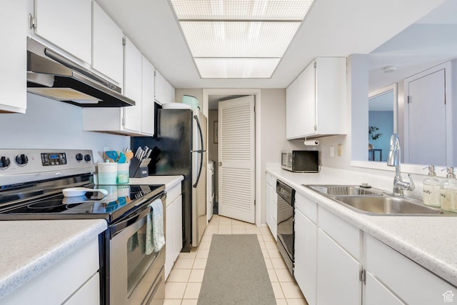 1275 E Shadow Ridge Dr S Unit 10N, Cottonwood Heights, UT 84047 - kitchen with under cabinet range hood, white cabinets, a sink, appliances with stainless steel finishes, and light tile patterned floors