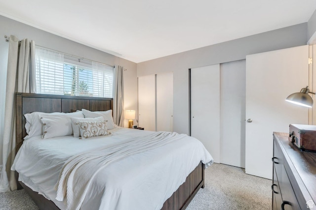 1275 E Shadow Ridge Dr S Unit 10N, Cottonwood Heights, UT 84047 - bedroom featuring multiple closets and light colored carpet