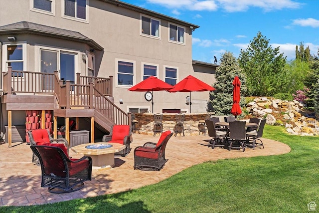 864 S Wellington Dr W, Kaysville, UT 84037 - view of patio with a fire pit, stairway, exterior kitchen, and a deck