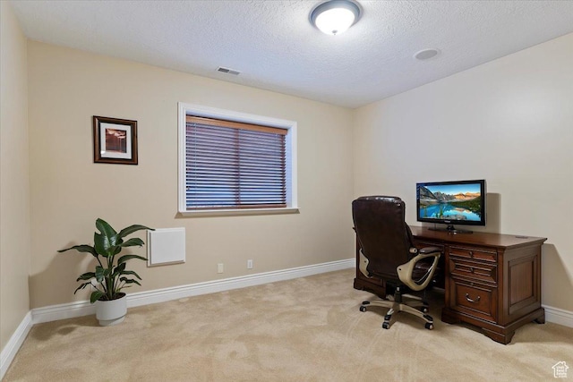 864 S Wellington Dr W, Kaysville, UT 84037 - home office with light colored carpet, baseboards, and a textured ceiling