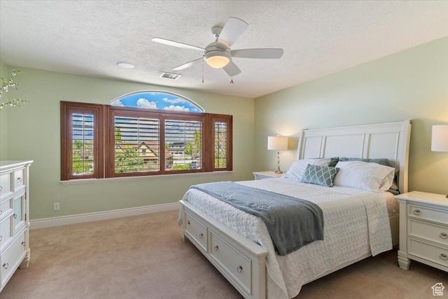 864 S Wellington Dr W, Kaysville, UT 84037 - bedroom with light carpet, a textured ceiling, a ceiling fan, and baseboards