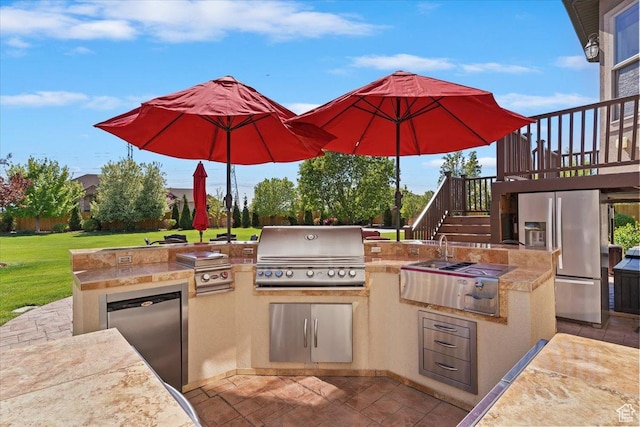 864 S Wellington Dr W, Kaysville, UT 84037 - view of patio / terrace featuring a grill, an outdoor kitchen, stairs, and a wooden deck