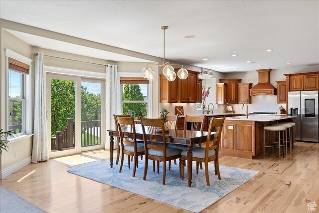864 S Wellington Dr W, Kaysville, UT 84037 - dining space with light wood-type flooring, baseboards, and recessed lighting