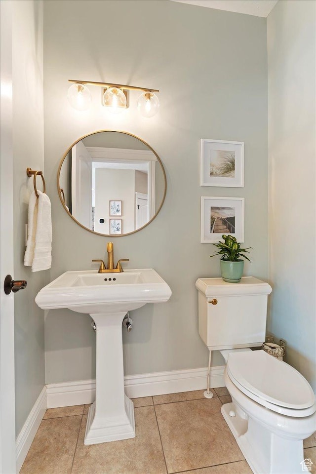 864 S Wellington Dr W, Kaysville, UT 84037 - half bath featuring baseboards, tile patterned floors, toilet, and a sink
