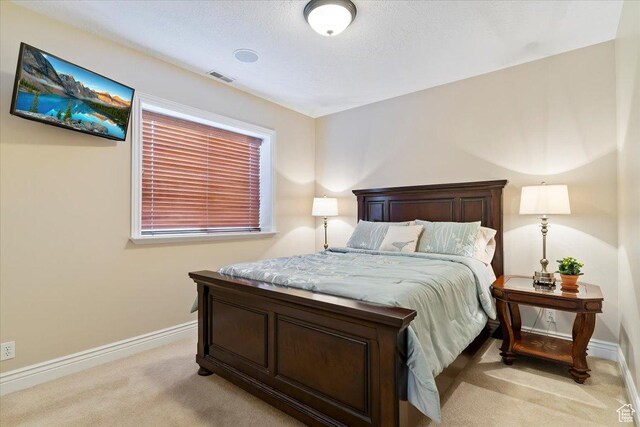 864 S Wellington Dr W, Kaysville, UT 84037 - bedroom featuring light carpet and baseboards
