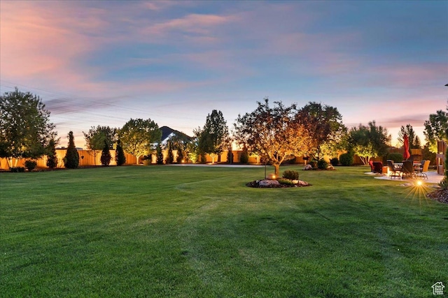 864 S Wellington Dr W, Kaysville, UT 84037 - surrounding community featuring a lawn and a patio area