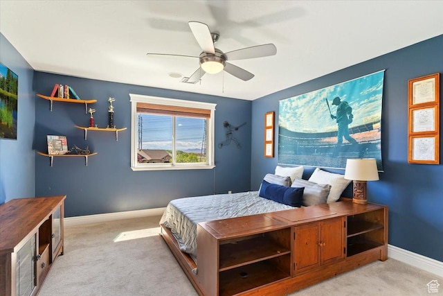 864 S Wellington Dr W, Kaysville, UT 84037 - bedroom with light colored carpet, baseboards, and ceiling fan