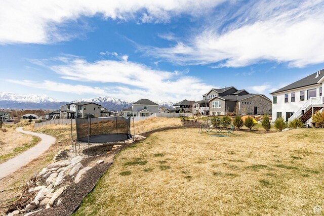 809 N 1490 E, Heber City, UT 84032 - view of yard featuring a residential view, a trampoline, and a mountain view