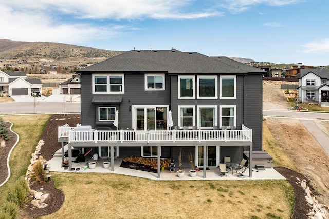 809 N 1490 E, Heber City, UT 84032 - rear view of property featuring a patio area, a deck with mountain view, a lawn, and a residential view