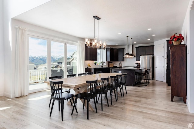 809 N 1490 E, Heber City, UT 84032 - dining room featuring light wood-style flooring, a chandelier, and recessed lighting