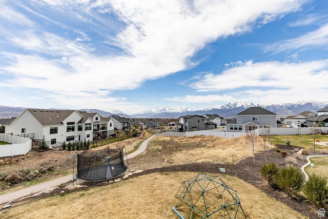 809 N 1490 E, Heber City, UT 84032 - view of yard featuring a trampoline, a residential view, a mountain view, and fence