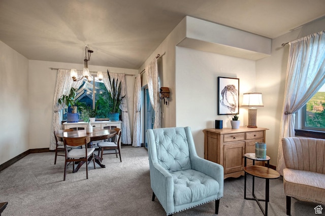 1261 W Black Rock Trl Unit 39F, Kamas, UT 84036 - dining space with carpet flooring and a chandelier