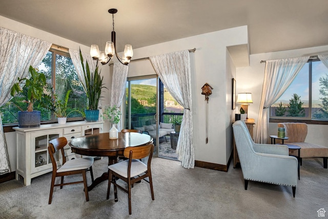 1261 W Black Rock Trl Unit 39F, Kamas, UT 84036 - dining space with a chandelier, light colored carpet, and plenty of natural light
