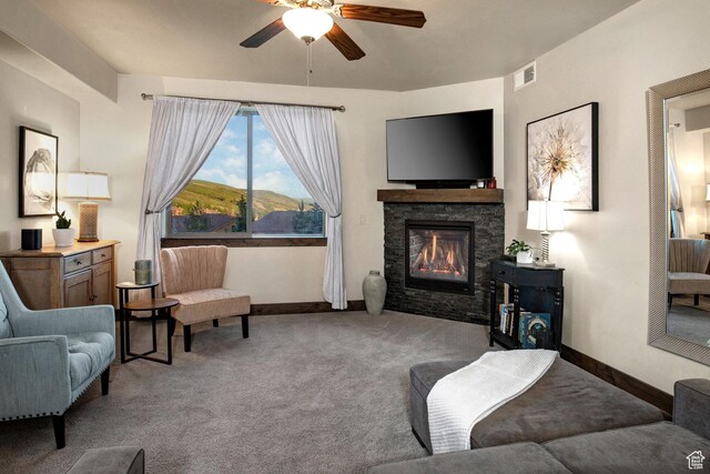 1261 W Black Rock Trl Unit 39F, Kamas, UT 84036 - living room featuring ceiling fan, carpet flooring, and a fireplace