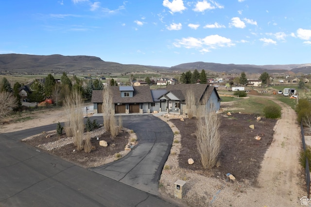1021 Sage Crk, Heber City, UT 84032 - view of front of home with curved driveway and a mountain view