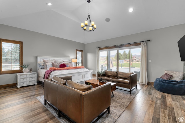 1021 Sage Crk, Heber City, UT 84032 - bedroom featuring baseboards, an inviting chandelier, multiple windows, and vaulted ceiling