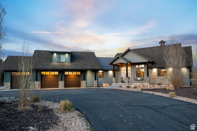 1021 Sage Crk, Heber City, UT 84032 - view of front of house with a porch, an attached garage, driveway, and stone siding