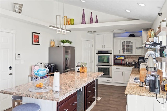 6268 S Faber Ln, Taylorsville, UT 84123 - kitchen with backsplash, stainless steel appliances, white cabinets, and recessed lighting