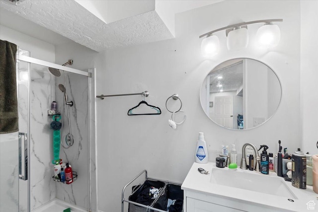 6268 S Faber Ln, Taylorsville, UT 84123 - full bathroom featuring vanity, a textured ceiling, and a marble finish shower