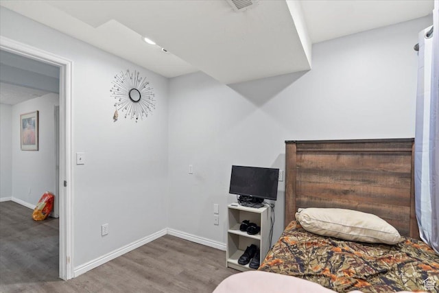 6268 S Faber Ln, Taylorsville, UT 84123 - bedroom with baseboards, wood finished floors, and visible vents